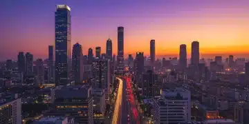 Dynamic city skyline at sunset, symbolizing US regional economic growth and future prosperity.